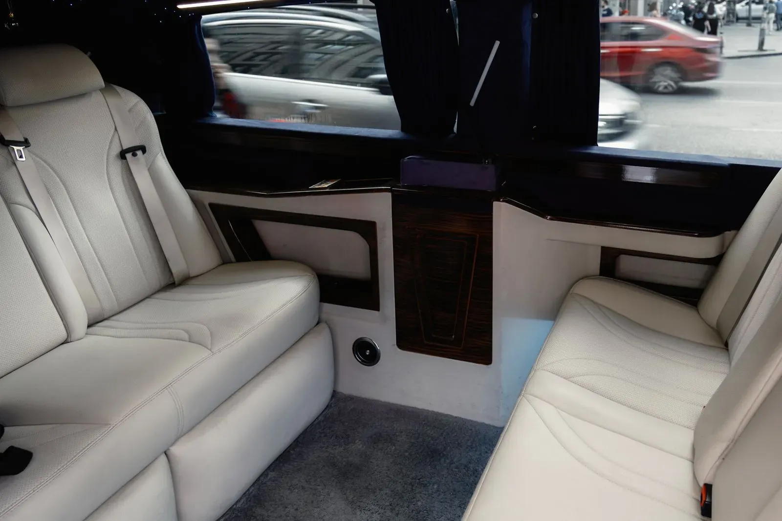 The leather rear cabin of a luxury vehicle