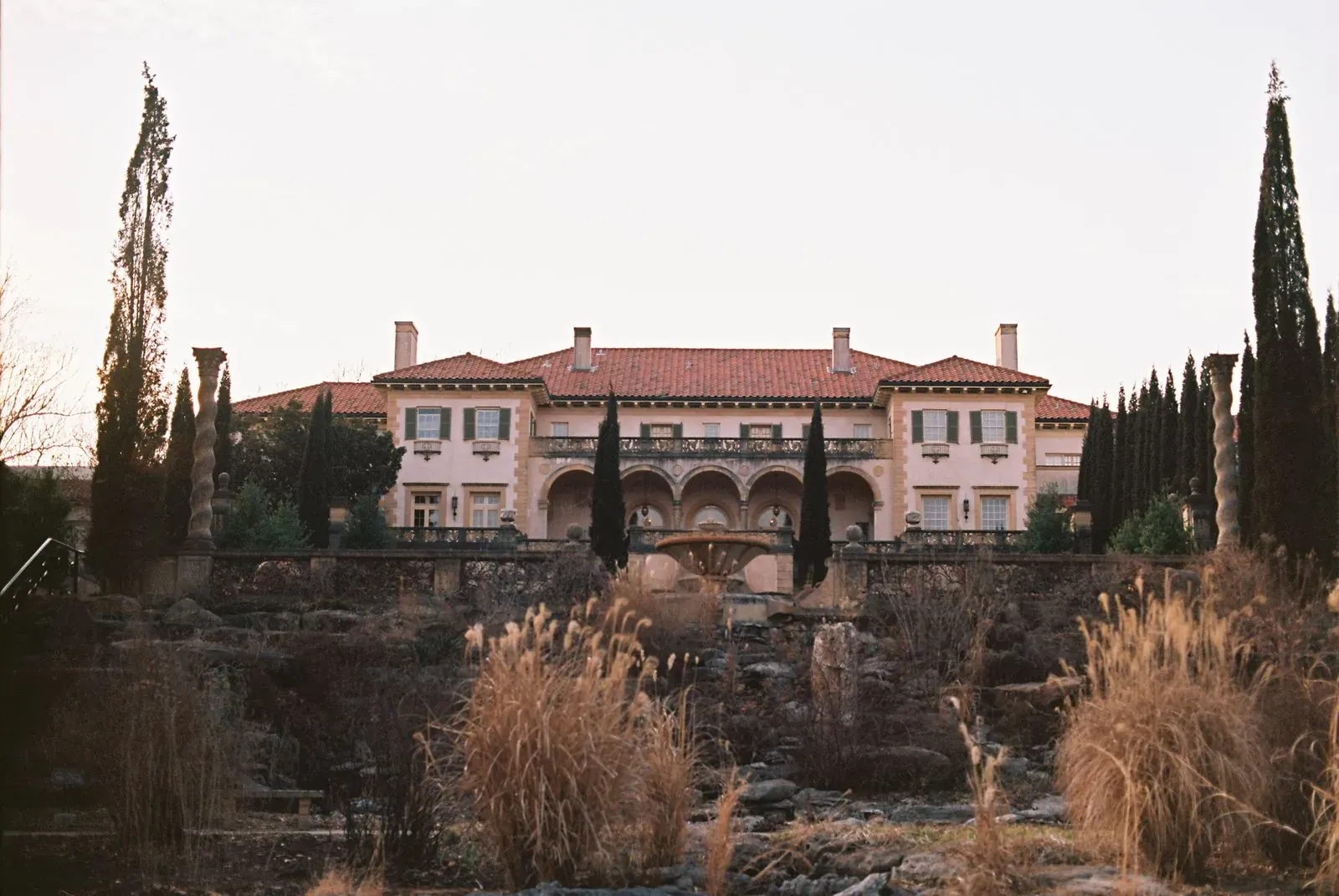 A historic mansion with formal gardens