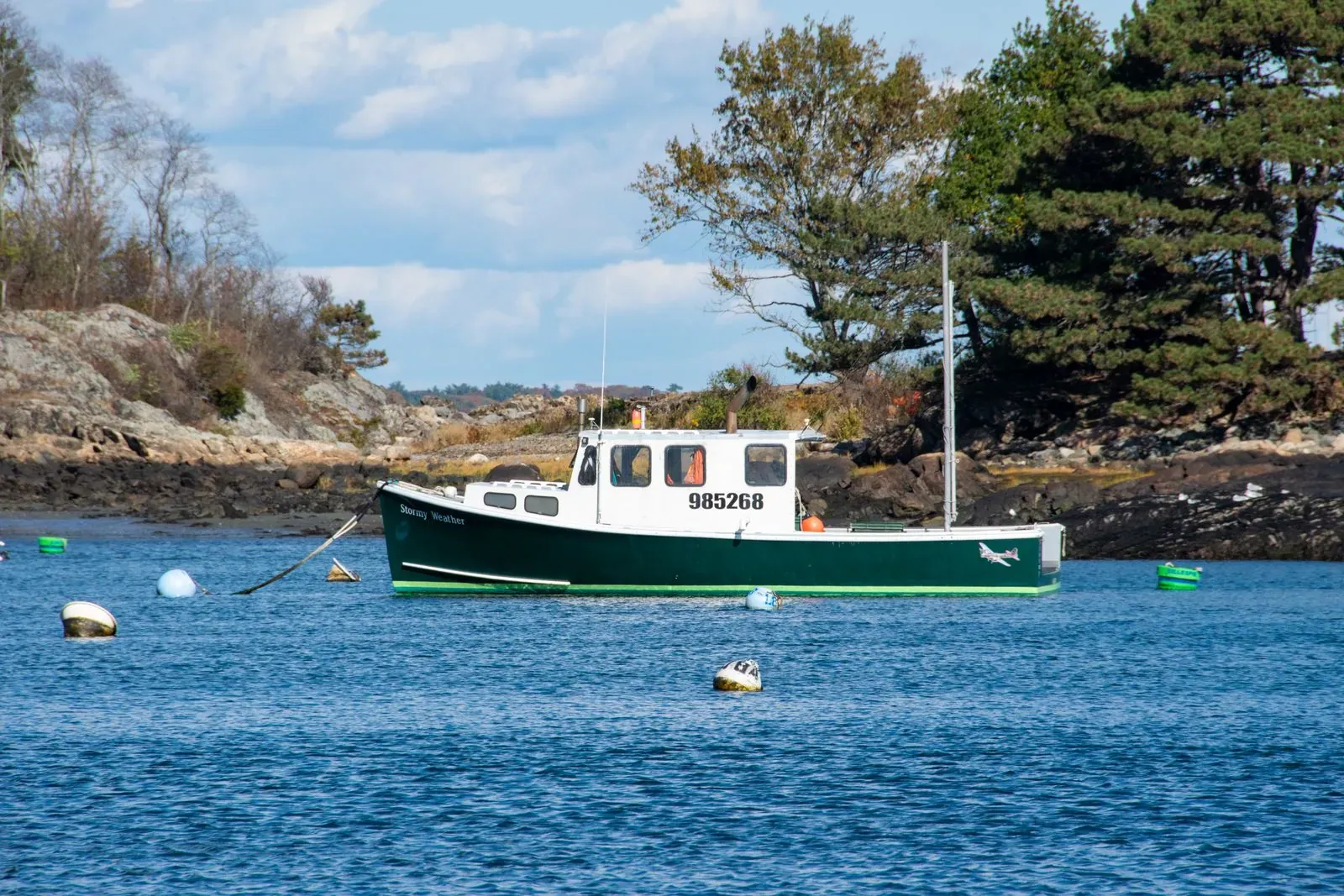 A boat moored in a calm harbor